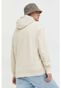 Tommy Jeans bluza bawełniana męska kolor beżowy z kapturem z aplikacją. Typ kołnierza: kaptur. Kolor: beżowy. Materiał: bawełna. Wzór: aplikacja #3