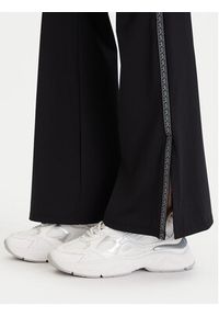 MICHAEL Michael Kors Legginsy MF530W51RE Czarny Flare Fit. Kolor: czarny. Materiał: syntetyk #4