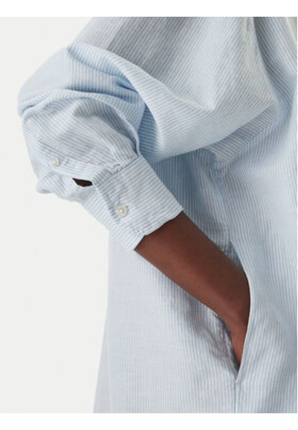 Tommy Jeans Sukienka koszulowa DW0DW22344 Błękitny Relaxed Fit. Kolor: niebieski. Materiał: len. Typ sukienki: koszulowe