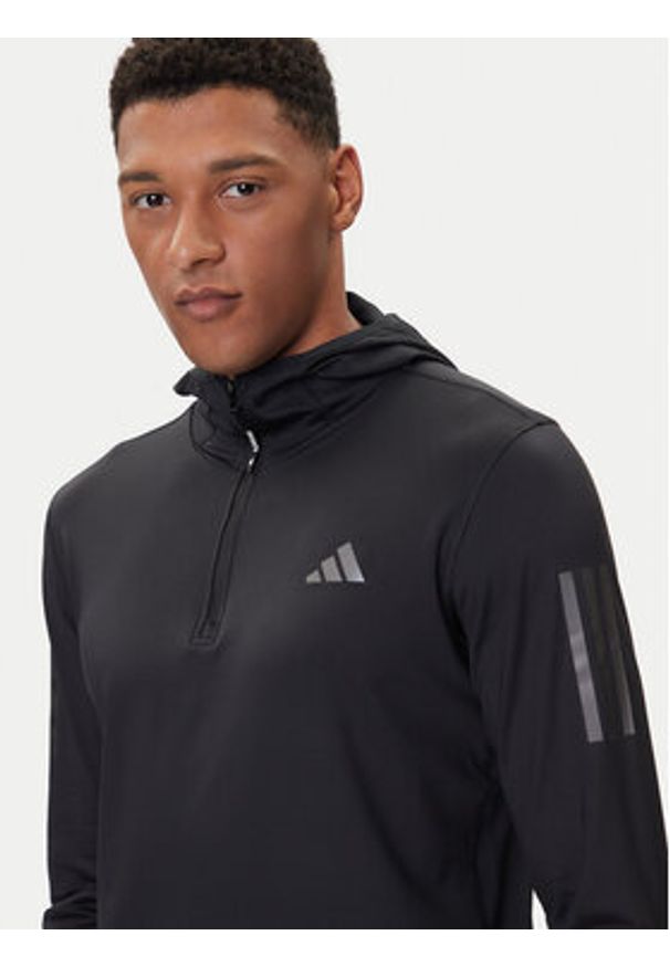 Adidas - adidas Bluza techniczna Own The Run Winterized JN6378 Czarny Slim Fit. Kolor: czarny. Materiał: syntetyk. Sport: bieganie