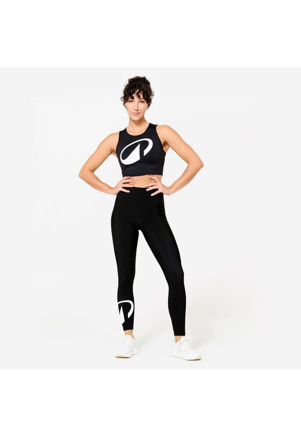 DOMYOS - Koszulka fitness damska Domyos bez rękawów crop top. Kolor: czarny. Materiał: materiał, poliester, elastan. Długość rękawa: bez rękawów. Sport: fitness