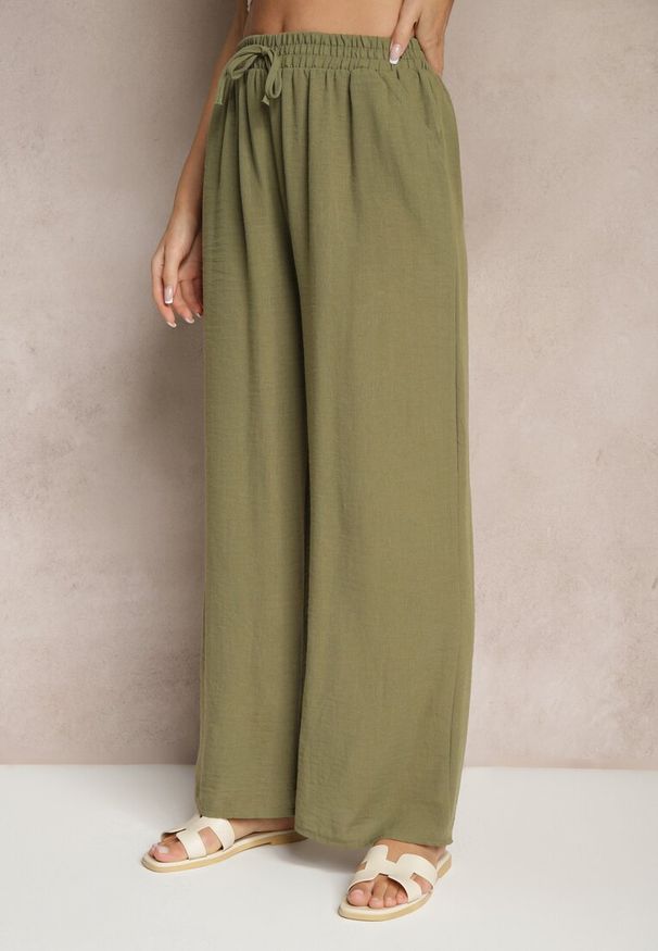 Renee - Ciemnozielone Spodnie o Szerokim Kroju High Waist Edilisea. Okazja: na spotkanie biznesowe, na co dzień, do pracy. Stan: podwyższony. Kolor: zielony. Styl: elegancki, biznesowy, casual