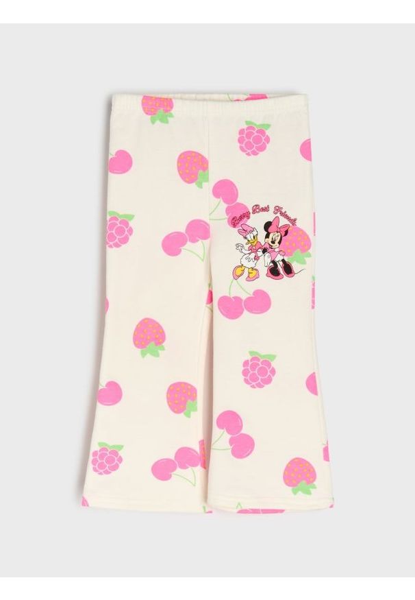 Sinsay - Bawełniane spodnie flare z nadrukiem Minnie Mouse - kremowy. Kolor: kremowy. Materiał: bawełna. Wzór: nadruk, motyw z bajki
