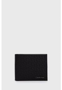 Calvin Klein - Portfel skórzany. Kolor: czarny. Materiał: materiał. Wzór: gładki #1