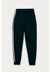 adidas Originals - Spodnie dziecięce 128-164 cm. Kolor: niebieski. Materiał: poliester, dzianina. Wzór: aplikacja #3