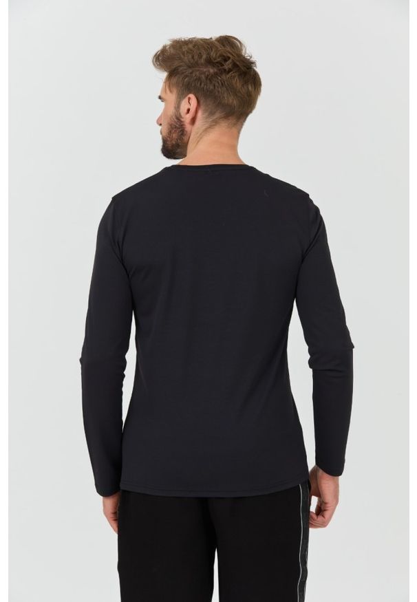Guess - GUESS Czarny longsleeve New Tech Str T. Kolor: czarny. Długość rękawa: długi rękaw