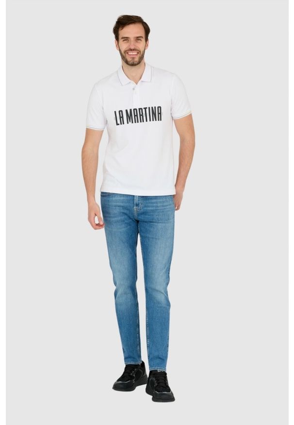 7 FOR ALL MANKIND Niebieskie jeansy męskie. Kolor: niebieski