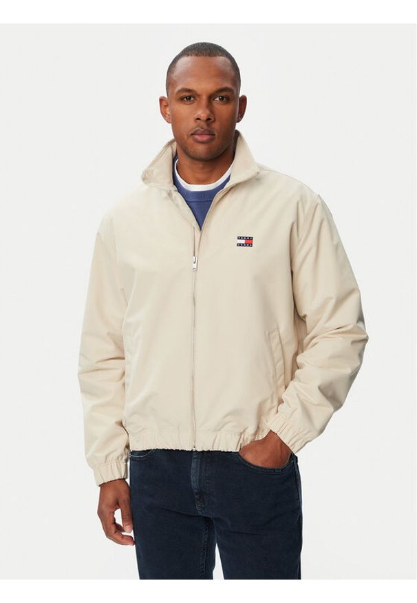 Tommy Jeans Kurtka przejściowa Essential DM0DM22720 Beżowy Regular Fit. Kolor: beżowy. Materiał: syntetyk