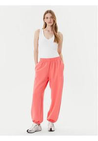 Adidas - adidas Spodnie dresowe ALL SZN Soft Lux lKD9773 Koralowy Loose Fit. Kolor: pomarańczowy. Materiał: syntetyk #3