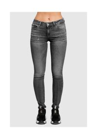 Guess - GUESS Szare jeansy damskie z brokatem. Kolor: szary. Wzór: aplikacja #1