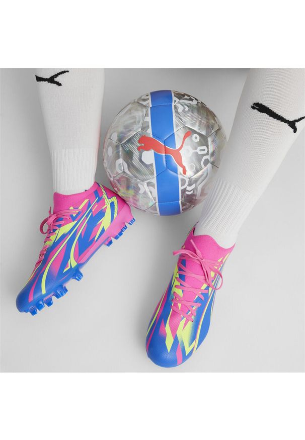 Buty piłkarskie męskie Puma Ultra Match Energy Fg Ag. Zapięcie: sznurówki. Kolor: żółty, wielokolorowy, niebieski. Materiał: materiał, syntetyk, tkanina. Szerokość cholewki: normalna. Sport: piłka nożna