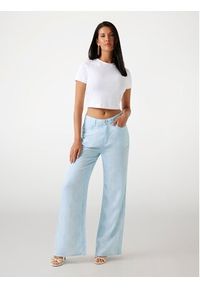 Guess Spodnie materiałowe 176485 Niebieski Slim Fit. Kolor: niebieski. Materiał: syntetyk #4