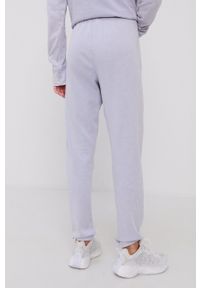 DKNY - Dkny Spodnie DP1P2777 damskie gładkie. Kolor: niebieski. Materiał: dzianina. Wzór: gładki #3
