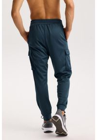 ROUGH RADICAL - Męskie spodnie dresowe Rough Radical Dynamic Pro Joggers Men. Kolor: niebieski. Materiał: dresówka. Sport: fitness