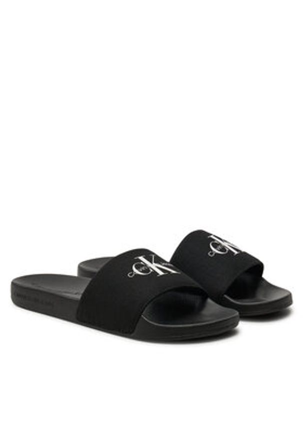 Calvin Klein Jeans Klapki Slide Monogram Wn YW0YW01835 Czarny. Kolor: czarny. Materiał: materiał
