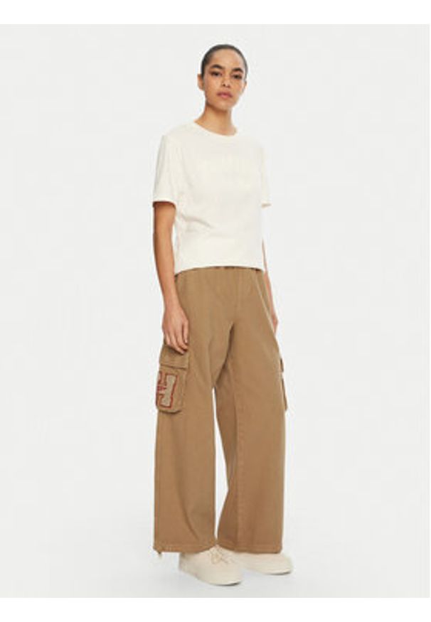 Tommy Jeans Spodnie materiałowe DW0DW20531 Beżowy Relaxed Fit. Kolor: beżowy. Materiał: bawełna