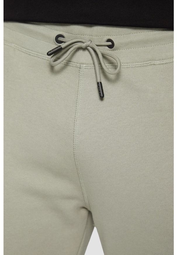 Guess - GUESS Zielone męskie spodnie Aldwin, Rozmiar L. Kolor: zielony