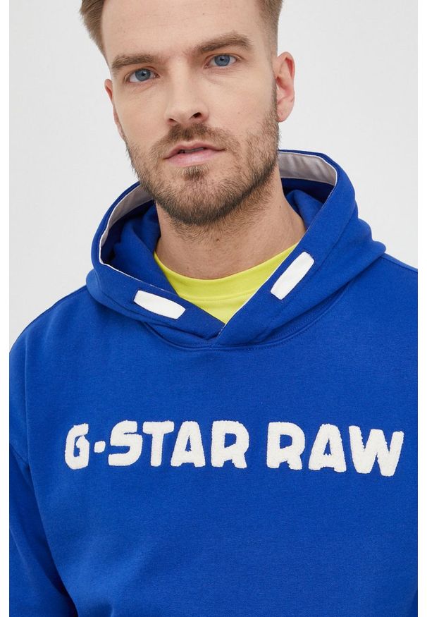 G-Star RAW - G-Star Raw Bluza z kapturem z nadrukiem. Okazja: na co dzień. Typ kołnierza: kaptur. Kolor: niebieski. Materiał: poliester. Wzór: nadruk. Styl: casual