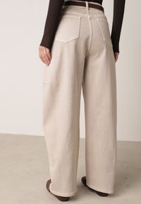 Born2be - Beżowe Bawełniane Jeansy o Kroju Balloon z Wysokim Stanem i Przeszyciami Katameia. Okazja: na co dzień. Stan: podwyższony. Kolor: beżowy. Wzór: aplikacja. Styl: casual, elegancki #4