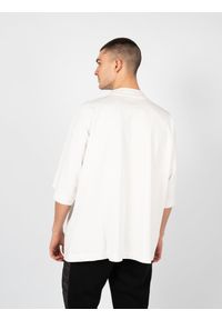 Yeezy Gap Engineered by Balenciaga - Yeezy Gap Engineered By Balenciaga T-Shirt "Logo" | 719614 TMVQ2 | Mężczyzna | Biały. Kolor: biały. Materiał: bawełna. Wzór: nadruk