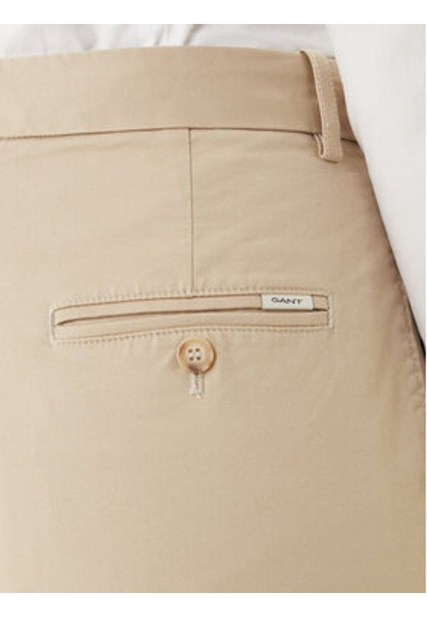 GANT - Gant Chinosy 4150380 Beżowy Slim Fit. Kolor: beżowy. Materiał: bawełna