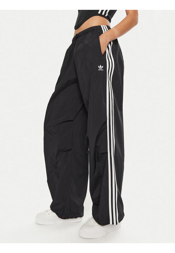 Adidas - adidas Spodnie dresowe 3-Stripes Woven Parachute IY7251 Czarny Loose Fit. Kolor: czarny. Materiał: syntetyk