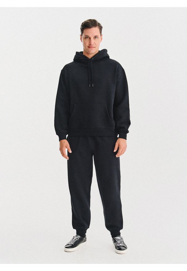 Pako Lorente - PAKO LORENTE - Czarna bluza dresowa z kapturem. Typ kołnierza: kaptur. Kolor: szary, czarny. Materiał: dresówka. Wzór: gładki
