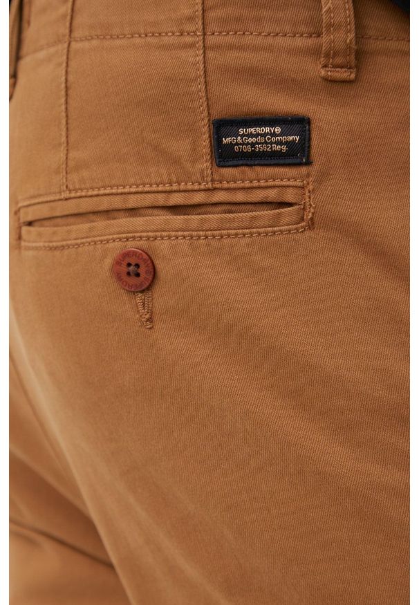 Superdry spodnie męskie kolor brązowy w fasonie chinos. Kolor: brązowy. Materiał: tkanina