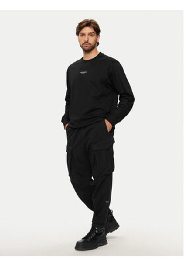G-Star RAW - G-Star Raw Spodnie dresowe Rovic D24964 D566 6484 Czarny Relaxed Fit. Kolor: czarny. Materiał: syntetyk, bawełna