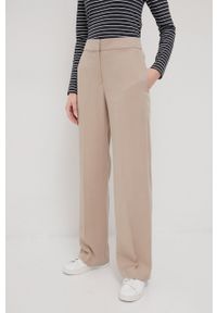 Hugo spodnie 50466992 damskie kolor beżowy proste high waist. Stan: podwyższony. Kolor: beżowy. Materiał: tkanina, włókno, lyocell #3