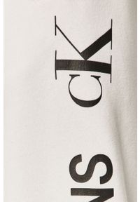 Calvin Klein Jeans - Spodnie. Kolor: biały. Materiał: bawełna, poliester, dzianina. Wzór: nadruk #4
