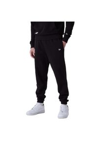 Spodnie męskie New Era MLB Essentls Jogger New York Yankees. Kolor: czarny. Materiał: dresówka