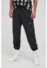 adidas Originals Spodnie męskie kolor czarny. Kolor: czarny. Materiał: materiał, tkanina