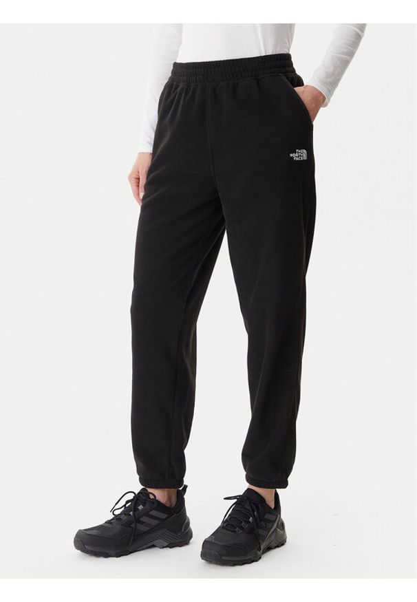 The North Face Spodnie dresowe Glacier NF0A8DQR Czarny Regular Fit. Kolor: czarny. Materiał: syntetyk