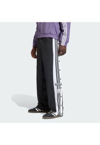 Adidas - adidas Spodnie dresowe Adibreak Classic KD4094 Czarny Regular Fit. Kolor: czarny. Materiał: syntetyk #1