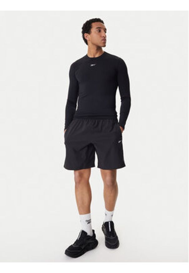 Reebok Koszulka techniczna RK25598CCM Czarny Slim Fit. Kolor: czarny. Materiał: syntetyk