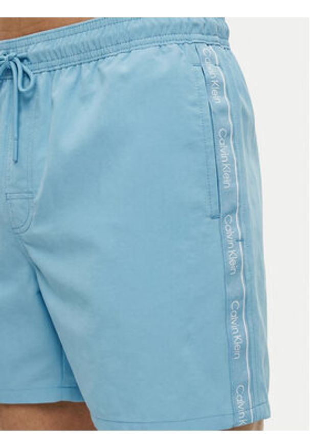 Calvin Klein Swimwear Szorty kąpielowe LV00N61002 Błękitny Regular Fit. Kolor: niebieski. Materiał: syntetyk