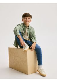 Reserved - Jeansy slim - niebieski. Kolor: niebieski. Styl: klasyczny #1