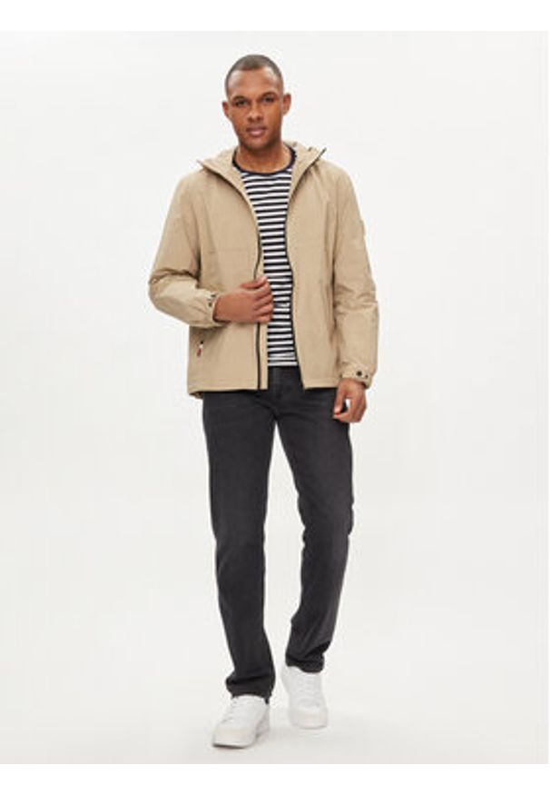 TOMMY HILFIGER - Tommy Hilfiger Kurtka przejściowa Portland MW0MW34456 Beżowy Regular Fit. Kolor: beżowy. Materiał: syntetyk