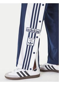 Adidas - adidas Spodnie dresowe Adibreak KD6325 Granatowy Loose Fit. Kolor: niebieski. Materiał: syntetyk #3