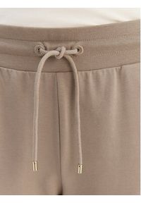 EA7 Emporio Armani Spodnie dresowe 7W000461 AF13135 U6167 Beżowy Regular Fit. Kolor: beżowy. Materiał: bawełna #3