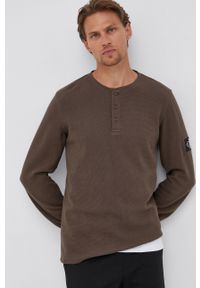 Calvin Klein Jeans Sweter bawełniany kolor zielony. Okazja: na co dzień. Kolor: zielony. Materiał: bawełna. Długość: krótkie. Wzór: aplikacja. Styl: casual
