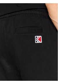 Karl Kani Spodnie dresowe Signature Essential 6004039 Czarny Relaxed Fit. Kolor: czarny. Materiał: bawełna