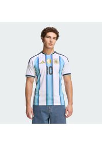 Adidas - Koszulka podstawowa Argentyna 26 Messi. Kolor: niebieski, wielokolorowy, biały. Technologia: ClimaCool (Adidas). Sport: piłka nożna #1