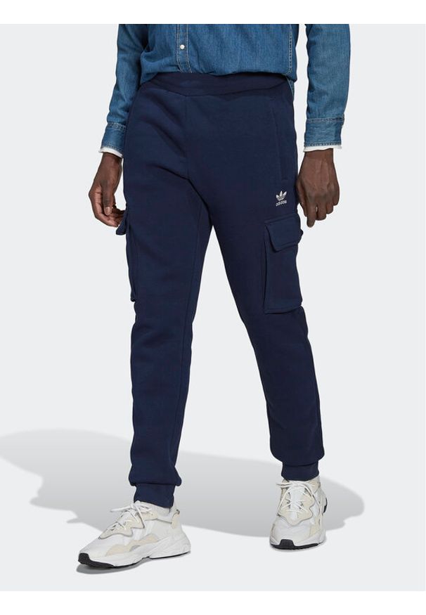 Adidas - adidas Spodnie dresowe adicolor Essentials Trefoil HK0185 Granatowy Slim Fit. Kolor: niebieski. Materiał: syntetyk, dresówka