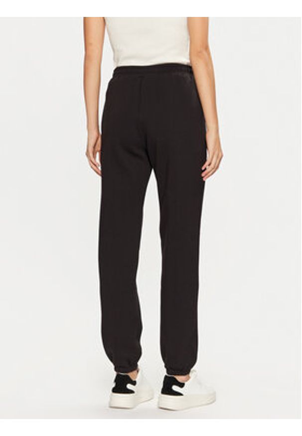 Guess Spodnie dresowe V5RB02 KCLD1 Brązowy Regular Fit. Kolor: brązowy. Materiał: bawełna