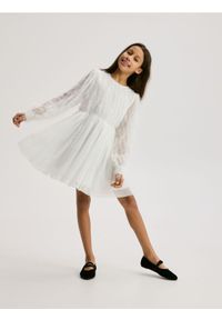 Reserved - Sukienka z piórami - złamana biel. Materiał: tkanina #1