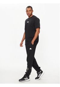 Adidas - adidas Spodnie dresowe Graphic Print IP4073 Czarny Regular Fit. Kolor: czarny. Materiał: bawełna. Wzór: nadruk #3