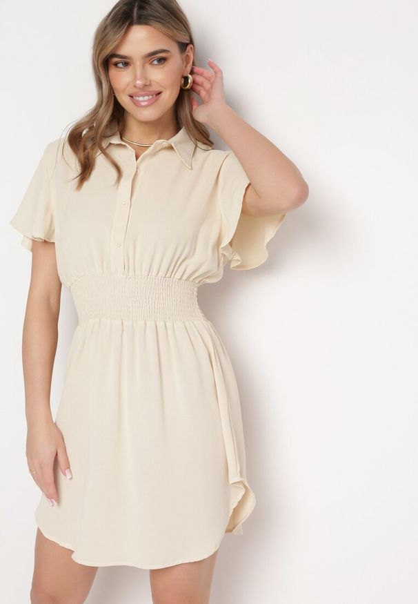 Born2be - Beżowa Koszulowa Sukienka Mini z Wiskozy o Rozkloszowanym Kroju Hokese. Kolor: beżowy. Materiał: wiskoza. Typ sukienki: koszulowe. Długość: mini
