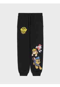 Sinsay - Spodnie dresowe PAW Patrol - czarny. Kolor: czarny. Materiał: dresówka